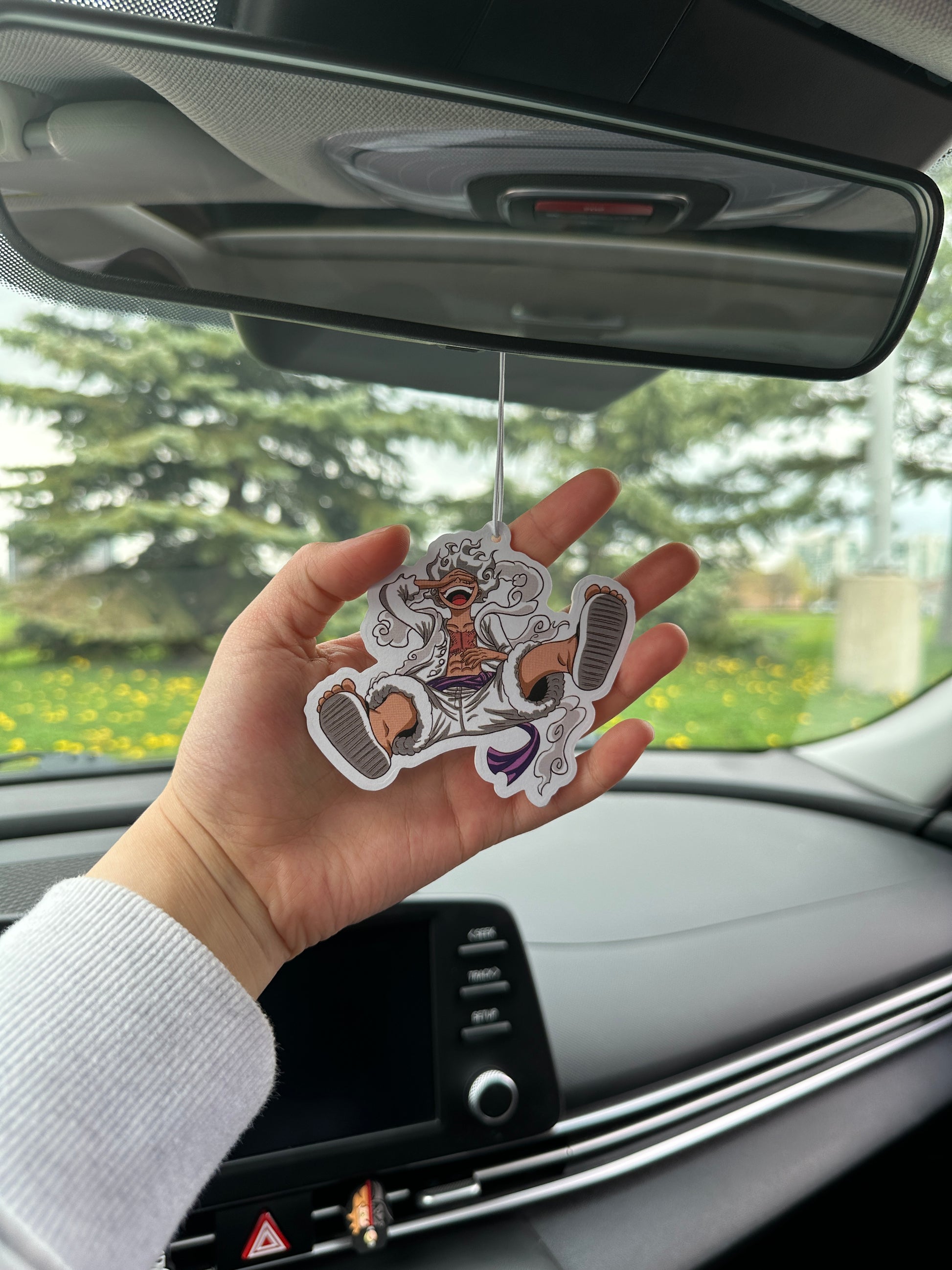 Roronoa Zoro, One Piece anime air freshener, Zoro scent, One Piece Zoro merchandise, Zoro artwork, Straw Hat Pirates, anime merch, best Zoro merchandise for One Piece fans, buy Zoro air freshener online, best one piece merch