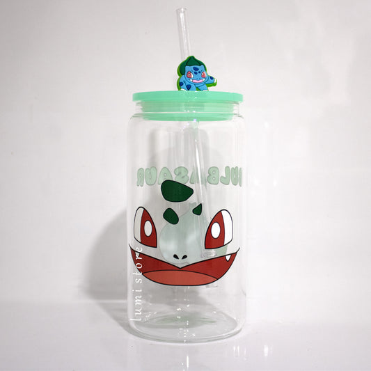Bulbasaur Glass Tumbler – a Pokemon-inspired 16oz glass cup! 🐉💖 Perfect for Pokemon lovers or a delightful self-indulgence. Each cup is HANDMADE, ensuring a unique piece. Elevate your sipping experience with this Glass Cup featuring a Colorful Lid and Reusable Straw.