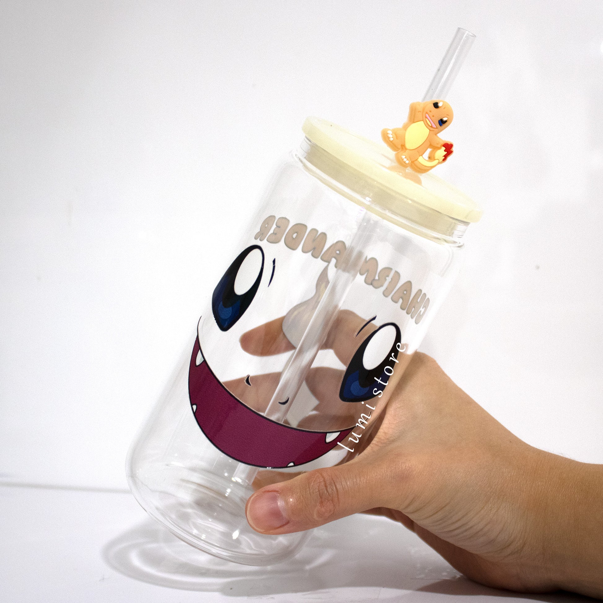 Charmander Glass Tumbler – a Pokemon-inspired 16oz glass cup! 🐉💖 Perfect for anime lovers or a delightful self-indulgence. Each cup is HANDMADE, ensuring a unique piece. Elevate your sipping experience with this Glass Cup featuring a Colorful Lid and Reusable Straw.