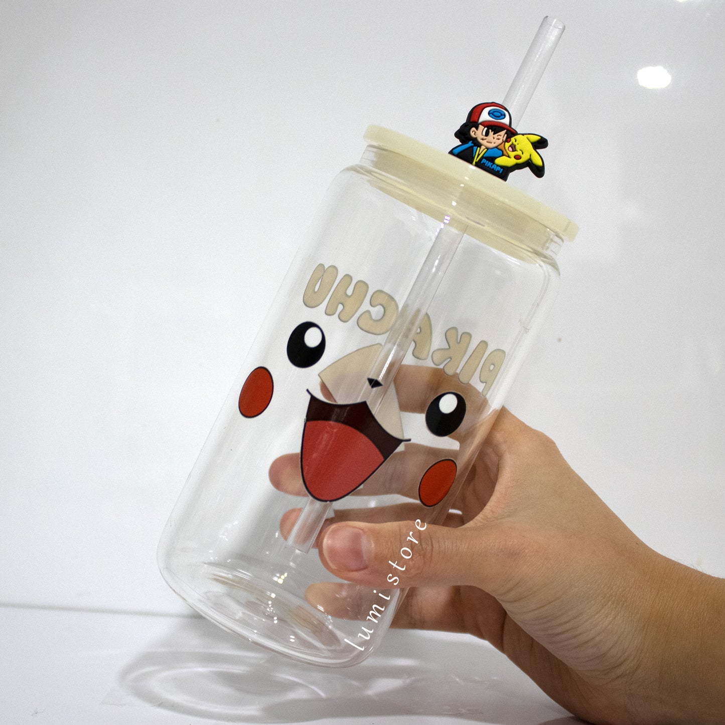 Pikachu Glass Tumbler – a Pokemon-inspired 16oz glass cup! 🐉💖 Perfect for Pokemon lovers or a delightful self-indulgence. Each cup is HANDMADE, ensuring a unique piece. Elevate your sipping experience with this Glass Cup featuring a Colorful Lid and Reusable Straw.