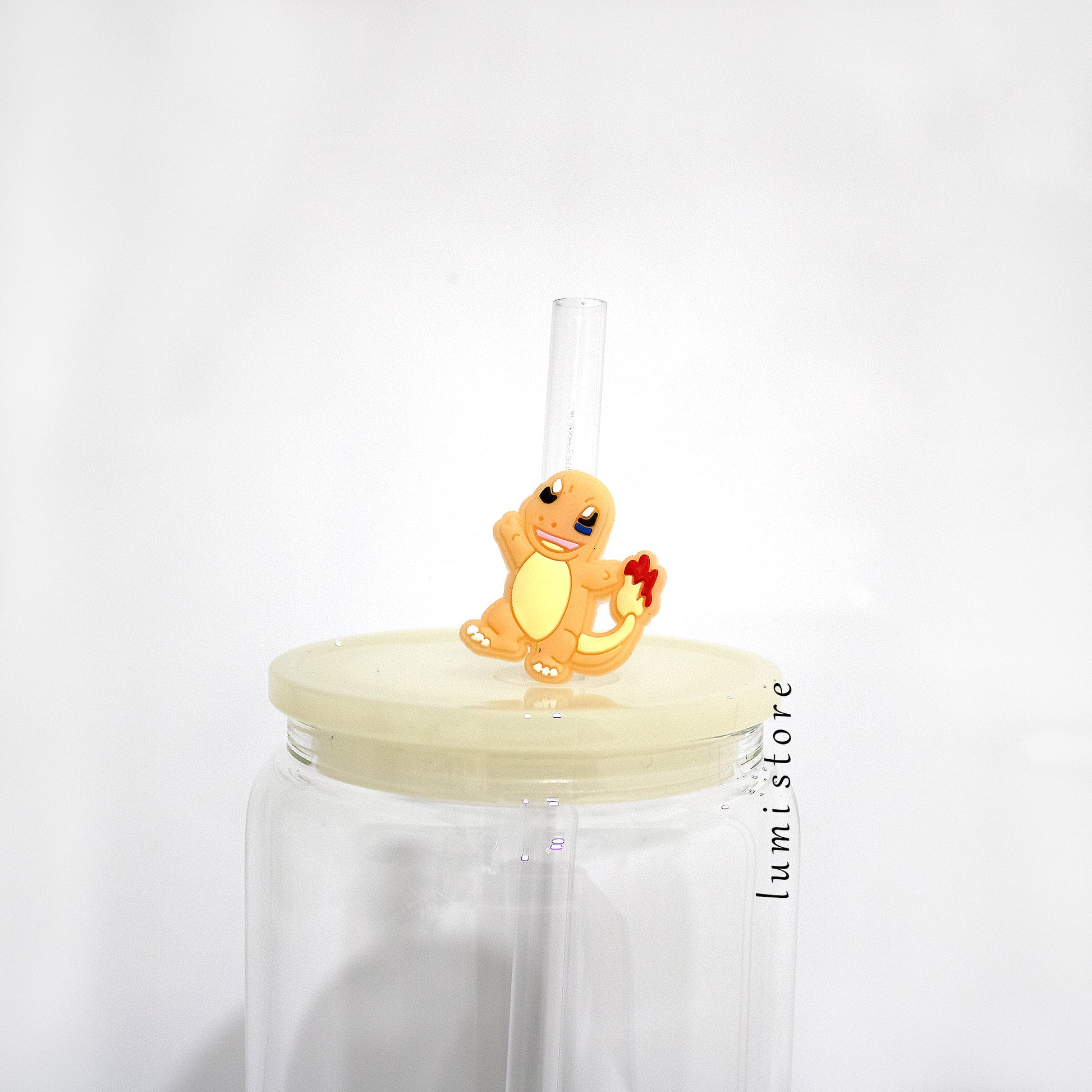 Charmander straw topper on glass cup