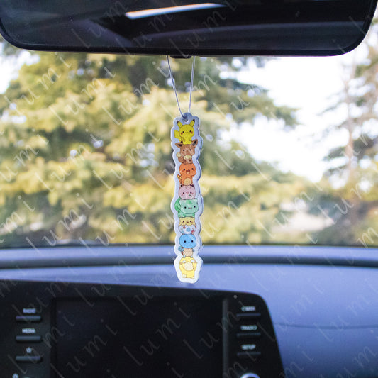 Air freshener featuring popular Pokémon characters including Pikachu, Eevee, Charmander, Jigglypuff, Bulbasaur, Togepi, Squirtle, and Psyduck.