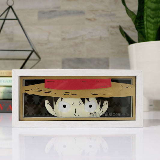 Discover our captivating 'One Piece Luffy Lightbox', an ideal collector's item for anime enthusiasts. This vibrant lightbox highlights Monkey D. Luffy's iconic straw hat and fearless persona, brilliantly illuminated to bring the character to life. Perfect for 'One Piece' fans and anime art collectors, it's a striking decor addition that embodies the adventurous spirit of the beloved series.